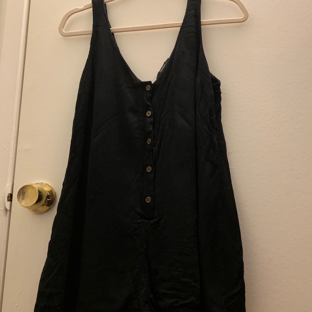 Black romper with cute brown buttons